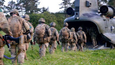 UK troops board Chinook helicopter