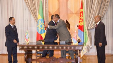 Ethiopian Prime Minister Abiy Ahmed (left) and Eritrean President Isaias Afwerki (right) hug after signing a Joint Declaration of Peace and Friendship at the state house in Asmara, Eritrea