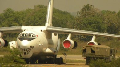 Ilyushin-76 aircraft off-loading ammunition crates in Juba