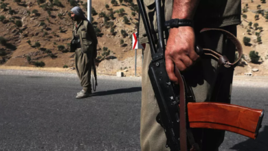 A 2018 file photo shows fighters of the Kurdistan Workers' Party (PKK) manning a roadblock in the Qandil Mountains, the groups's main rear-base in northern Iraq