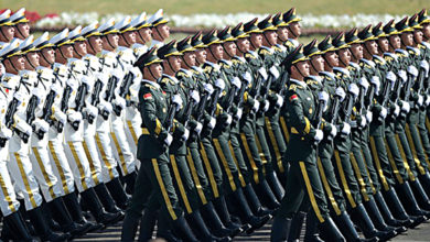 Chinese soldiers march on.