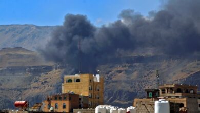 Smoke billows following a reported airstrike by the Saudi-led coalition in the Yemeni capital Sanaa, on November 27, 2020
