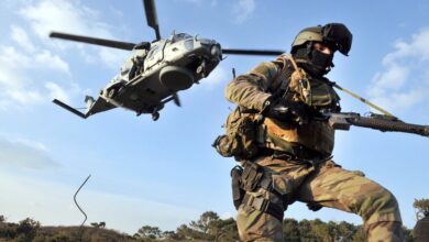 A soldier of French Jaubert naval commando pictured after getting off a NH90 “Caiman” helicopter during an exercise