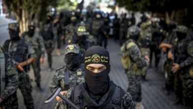 Members of the Palestinian Islamic Jihad movement march during a military parade in Gaza City on October 4, 2018