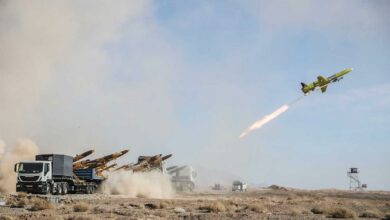 A handout photo from the Iranian Army on 6 January 2021 shows the launching of a drone carrying a missile, during a military drill in central Iran