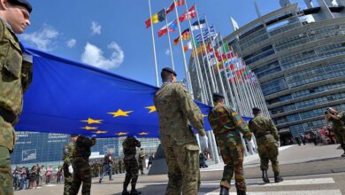 Military carrying European Union flag