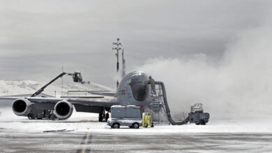 Airmen from the 151st Maintenance Group deice a KC-135 Stratotanker
