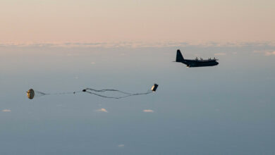 A Rapid Dragon missile falls from the cargo hold of an MC-130J Commando II.
