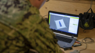 Additive manufacturing analyst uses 3D-printing software.