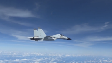 People’s Liberation Army - Navy J-11 fighter pilot performed an unsafe maneuver during an intercept of a U.S. Air Force RC-135 aircraft