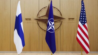 Finnish, NATO, and US flags