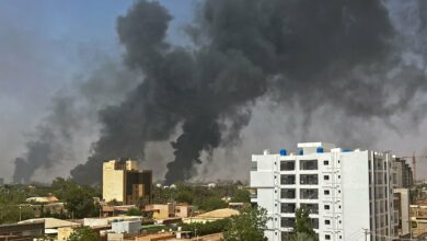 Smoke billows above residential buildings as fighting raged between rival generals in Khartoum, Sudan