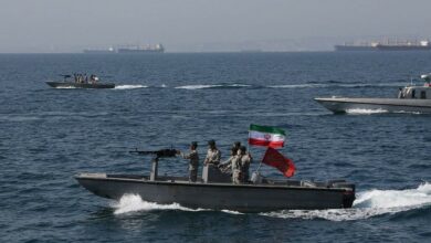Iranian soldiers take part in the National Persian Gulf Day in the Strait of Hormuz
