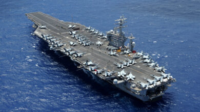 The aircraft carrier USS Dwight D. Eisenhower (CVN 69) transits the Atlantic Ocean. Dwight D. Eisenhower is returning to homeport at Norfolk, Va. after operating in the U.S. 5th and 6th Fleet areas of responsibility in support of Operation Enduring Freedom, maritime security operations and theater security cooperation efforts. (U.S. Navy photo by Mass Communication Specialist 2nd Class Ryan D. McLearnon/Released)