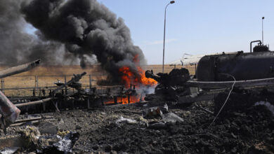 Smoke billows from the Babasi oil facility in the countryside of al-Qahtaniya in Syria's Kurdish-controlled northeastern Hasakeh province on October 6, 2023 following a Turkish strike