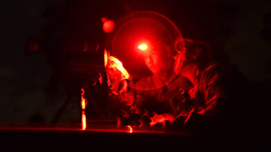 Two Tactical Air Control Party Airmen assigned to the 25th Air Support Operations Squadron, from Wheeler Army Air Field, Hawaii, troubleshoot a Special Operations Forces Laser Acquisition Marker during training at Poinsett Electronic Combat Range, Wedgefield, S.C., March 24, 2015. The SOFLAM is used to mark targets for aircraft identification as well as provide guidance for precision laser guided munitions during ground base laser designation. (U.S. Air Force photo by Senior Airman Diana M. Cossaboom/Released)