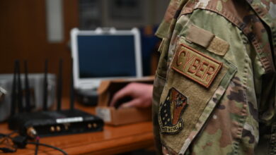 A U.S. Air National Guard Cyber Security Operations specialist assigned to the 148th Fighter Wing, Minnesota Air National Guard, inspects electrical components for radio communication at the Duluth, Minn., Air National Guard Base on Mar. 07, 2023. Cyber Security Operations specialists provide the best and most secure systems and ensure they operate properly while remaining secure from outside intrusion. (Air National Guard Photo by Airman 1st Class Tylin Rust)