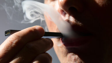 A person using e-cigarette