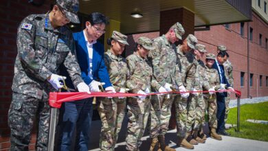 Leadership from U.S. Army Garrison Humphreys, the U.S. Army Corps of Engineers Far East District, and the Korea Ministry of National Defense and their distinguished guests opened new unaccompanied enlisted housing during a ribbon-cutting ceremony May 31, 2024, on Camp Humphreys, South Korea. These housing facilities will allow military personnel to enjoy suite-style living with many included amenities while living on base. (U.S. Army photo by Sgt. Duong Le)