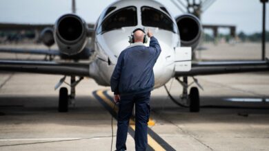 A 12th Maintenance Group aircraft maintenance technician signals to the pilots of the T-1 Jayhawk during the last 99th Flying Training Squadron’s Pilot Instructor Training flight May 17, 2024, at Joint Base San Antonio-Randolph, Texas. The Air Force is divesting the T-1 as a part of its ongoing realignment of Undergraduate Pilot Training. As the aircraft is divested, the units will transition to Air Mobility Fundamentals-Simulator training which will provide an efficient, medium-cost training program to learn required fundamentals and bridge the gap between training aircraft. (U.S. Air Force photo by Sean Worrell)