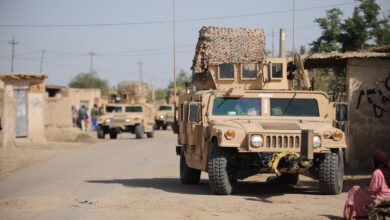 Humvee's from the 532nd Expeditionary Security Forces Squadron, Joint Base Balad, Iraq, conduct security during a patrol in the village of Abo Atei, April 9, in support of Operation Iraqi Freedom.
