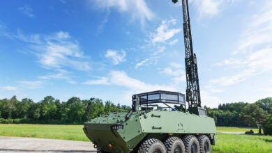 Piranha 5 equipped with Tactical Wide Area Network (TaWAN) mast