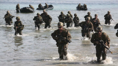 Philippine and US Marines simulate a beach landing from combat rubber raiding crafts onto a small island off the coast of Palawan, Philippines