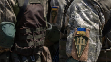 Ukrainian soldiers stand in formation during the closing ceremony of Agile Spirit 19 at Orpholo Training Area, Georgia, Aug. 9, 2019. AgS19 is a joint, multinational exercise co-led by the Georgian Defense Forces and U.S. Army Europe. Approximately 3,300 military personnel from 14 ally and partner nations participated in this theater security cooperation exercise. The brigade-level exercise incorporated a command-post exercise, field-training exercise and live fires. AgS19 occurred at three training locations in Georgia - Senaki Air Base, Vaziani and Orpholo Training Areas. (U.S. Army photo by Pfc. Laurie Ellen Schubert, 5th Mobile Public Affairs Detachment)