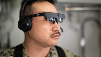 Naval Surface Warfare Center, Port Hueneme Division Fire Controlman Petty Officer 1st Class Donald Tran wears augmented reality glasses during an Augmented Reality Maintenance System demonstration aboard USS Spruance (DDG 111) on April 23. The headset allows a sailor underway to communicate in real time with a subject matter expert working shoreside, while the visor provides a visual of what the sailor sees.