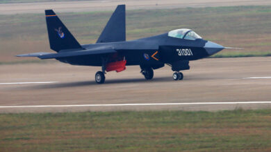 --FILE--A Chinese J-31 stealth fighter jet taxis before taking off for a demonstration flight during the 10th China International Aviation and Aerospace Exhibition, also known as Airshow China 2014, in Zhuhai city, south China's Guangdong province, 11 November 2014. China has tested the latest version of its fifth-generation stealth fighter, state media reported on Monday (26 December 2016), as it tries to end the West's monopoly on the world's most advanced warplanes. The test comes as the nation flexes its military muscles, sending its sole aircraft carrier the Liaoning into the western Pacific in recent days to lead drills there for the first time. The newest version of the J-31, now renamed the FC-31 Gyrfalcon, took to the air for the first time on Friday, the China Daily reported. The so-called "fifth-generation" twin engine jet is China's answer to the US F-35, the world's most technically advanced fighter. The new FC-31 has "better stealth capabilities, improved electronic equipment and a larger payload capacity" than the previous version which debuted in October 2012, the newspaper said, quoting aviation expert Wu Peixin. (Photo by Li jianshu / Imaginechina via AFP)