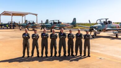 Paraguayan aircrew in front of four new A-29 Super Tucano aircraft