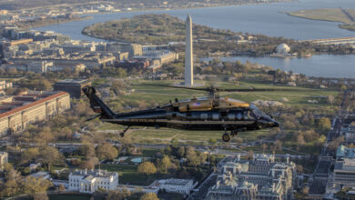 U.S. Army Capt. Chris Bissett and Warrant Officer Eric Mendoza, pilots, and U.S. Army Staff Sgt. Daniel Pechacek, crew chief, all assigned to Alpha Company, 12th Aviation Battalion, The Army Aviation Brigade, fly a VH-60M Black Hawk helicopter past the White House, Washington, D.C., March 25, 2024. The 12th Aviation Battalion uses VH-60M "gold top" Black Hawks to conduct priority air transport in support of Department of the Army senior leadership and other senior Department of Defense officials. (U.S. Air Force photo by Mr. Nicholas A. Priest)