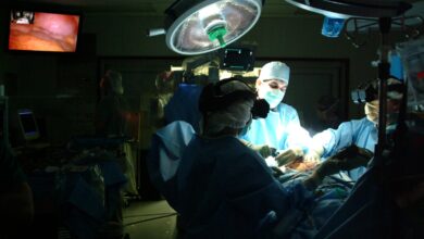 A medical team performs three-dimensional minimally invasive surgery at Walter Reed Army Medical Center in Washington, D.C. Photo by John Chew