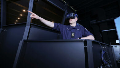 The Royal Navy is embracing Virtual Reality to train sailors guiding warships on operations worldwide. Shown here is LH Quinn conducting training within the virtual reality training simulator. Nine hi-tech bridge simulators – which accurately recreate both the bridge of present-day warships, but also the key waters and harbours they operate in – have been installed at sites in England and Scotland, led by the Navy’s warfare school at HMS Collingwood in Fareham. The £27m investment in partnership with Team Fisher, (a consortium of partners led by Capita which delivers shore-based training for the Royal Navy) and Metaverse VR, is intended to make learning navigation and running a bridge more realistic, better and potentially faster. Five simulator suites have been installed at HMS Collingwood: two large ‘full mission’ simulators with wrap-around digital display screens and virtual reality headsets, a smaller version with an LCD display and finally two small trainers – more akin to a video gaming set-up, but with the same features/accuracy as their full-size counterparts.