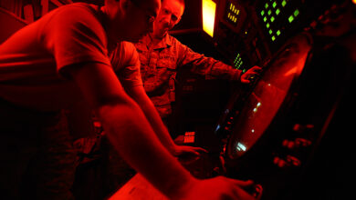Airman 1st Class Nathaniel Kearn and Staff Sgt. Christopher Loper verify radar data during a preventive maintenance inspection on a mobile radar system at Joint Base Balad, Iraq, Dec. 18. The Airmen are deployed from Mountain Home Air Force Base, Idaho. Kearn, a 727th Expeditionary Air Control Squadron ground radar systems apprentice, is a Harrah, Okla., native. Loper, a 727th EACS ground radar systems supervisor, is a Houston native.