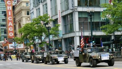 Members of the 8th Infantry Regiment Illinois National Guard Association ride in Illinois National Guard vehicles during the Chicago Memorial Day Parade on May 27, 2023. The association was started by Illinois Army National Guard Veterans dedicated to keeping the history of the Illinois National Guard's all-Black 8th Infantry Regiment alive. The association gives thousands of dollars worth of scholarships to deserving local high school seniors each year. Maj. Gen. Rodney Boyd, the Assistant Adjutant General - Army of the Illinois National Guard and Commander of the Illinois Army National Guard, served as the Grand Marshal of the Chicago Memorial Day Parade on May 27, 2023. Boyd grew up on the South Side of Chicago and is the highest-ranking officer of color in the history of the Illinois National Guard.