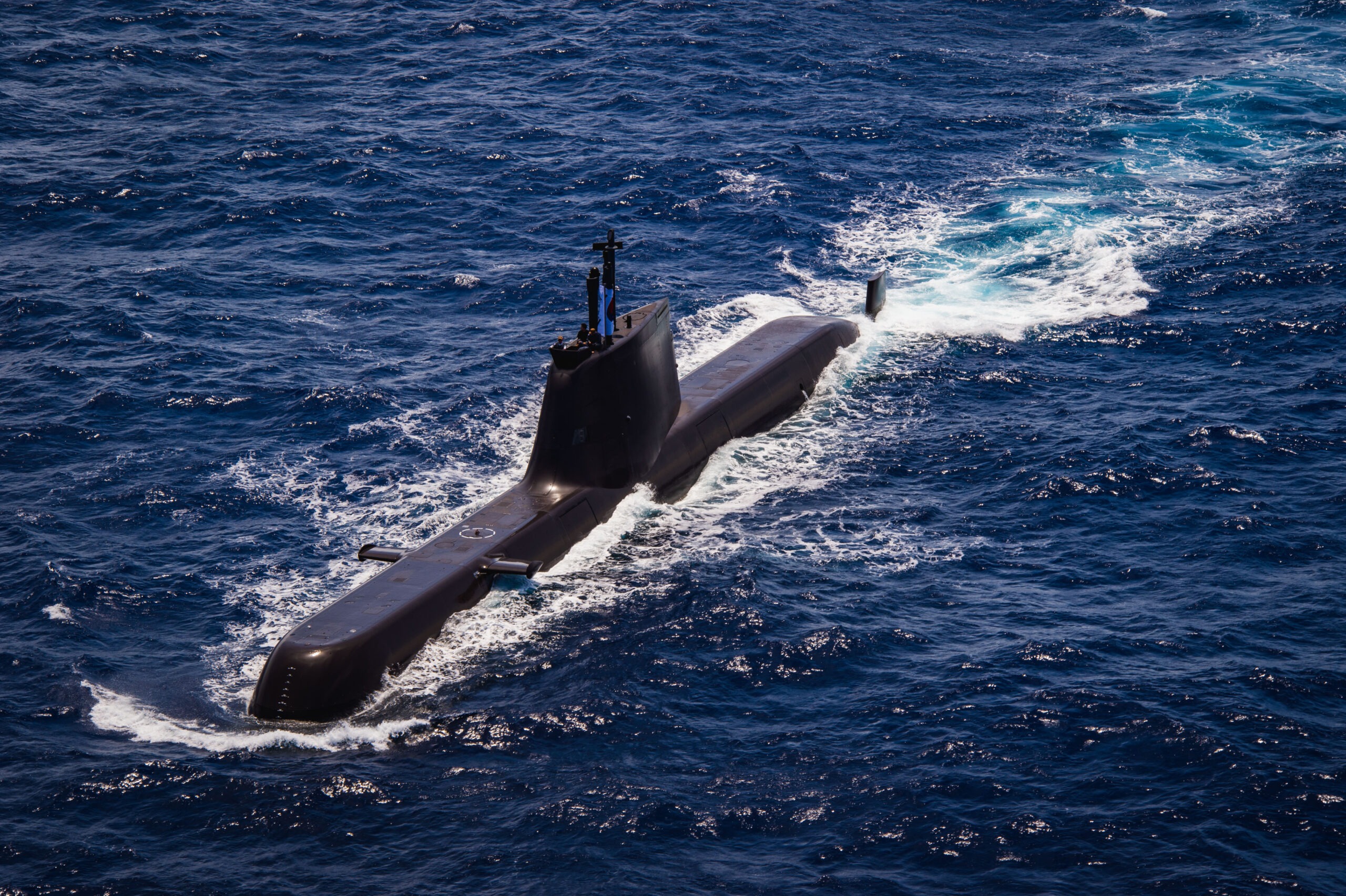 Republic of Korea navy Sohn Won-yil-class submarine ROKS Lee Beom-seok (SS 081) sails during the force integration phase of Exercise Rim of the Pacific (RIMPAC) 2024, July 22. Twenty-nine nations, 40 surface ships, three submarines, 14 national land forces, more than 150 aircraft and 25,000 personnel are participating in RIMPAC in and around the Hawaiian Islands, June 27 to Aug. 1. The world’s largest international maritime exercise, RIMPAC provides a unique training opportunity while fostering and sustaining cooperative relationships among participants critical to ensuring the safety of sea lanes and security on the world’s oceans. RIMPAC 2024 is the 29th exercise in the series that began in 1971. (U.S. Navy photo by Mass Communication Specialist 2nd Class Terrin Hartman)