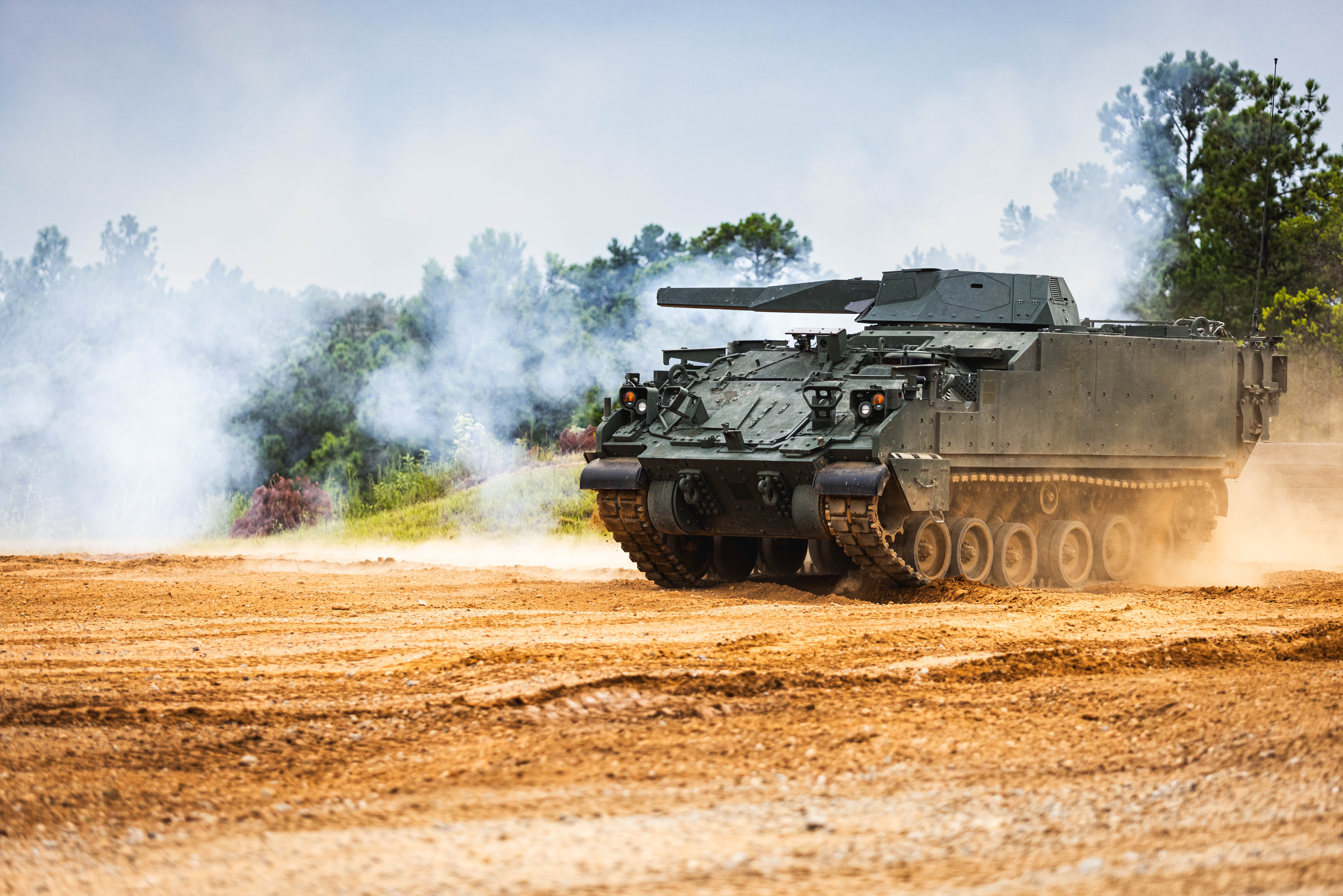Soldiers from the Maneuver Center of Excellence conduct a live-fire demonstration featuring the Armored Multi-Purpose Vehicle Modular Turreted Mortar System prototype, Sept. 10, 2024 at Red Cloud Range, at Fort Moore, Georgia, as part of the annual Maneuver Warfighter Conference. The AMPV MTMS is a prototype that integrates a remote-controlled 120mm mortar system into the AMPV. (U.S. Army Photo by Capt. Stephanie Snyder)