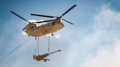 A CH-47 Chinook helicopter with 1st Battalion, 168th Aviation (General Support), 96th Aviation Troop Command, Washington National Guard airlifts a M777 towed 155mm howitzer during a training exercise with 2nd Battalion, 146th Field Artillery Regiment, 81st Stryker Brigade Combat Team, Washington National Guard at Yakima Training Center, Wash., July 17, 2025. The 96th Aviation Battalion’s CH-47 helicopters have the ability to slingload cargo from their undercarriage, including the M777 towed 155mm howitzer artillery cannons. (U.S. Army National Guard photo by Spc. Tristin Salisbury)