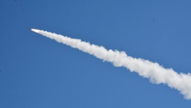 A Guided Multiple Launch Rocket System (GMLRS) fired in the sky