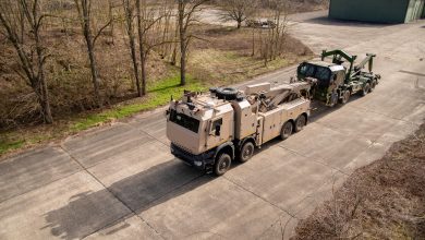 A Protected Recovery Vehicle towing a military system