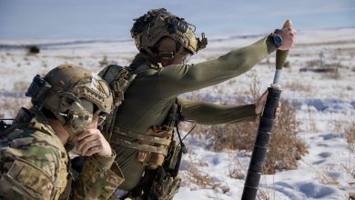 A Green Beret assigned to 3rd Battalion, 10th Special Forces Group (Airborne) hangs a 60mm mortar round from a M225A mortar system on a live-fire range. The live-fire range reinforced the Green Berets’ ability to operate in austere environments where indirect fire proficiency is critical to mission success and team survivability. (U.S. Army photo by Staff Sgt. David Cordova)