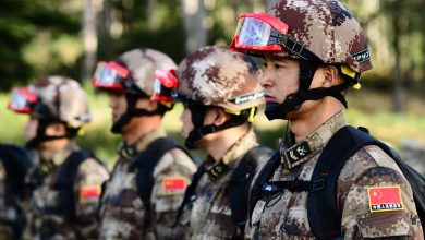 Soldiers from the People’s Liberation Army (PLA) listen to a briefing in preparation for a search and extraction exchange during the 13th annual U.S.-China Disaster Management Exchange at Camp Rilea Armed Forces Training Center, November 17, 2017, in Warrenton, Ore. U.S. Army Pacific hosts the annual exchange with the PLA to foster mutual trust and understanding while sharing lessons learned to increase disaster response capabilities in the Pacific region. (Photo by Sgt. 1st Class April Davis, Oregon Military Department Public Affairs)
