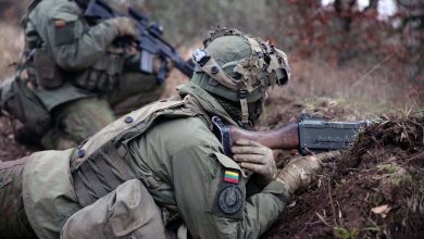 Lithuanian troops defend their position versus opposing forces during a combat exercise.