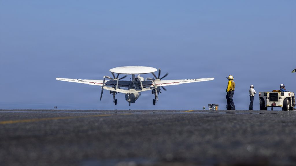 An E-2D Hawkeye, attached to Airborne Command & Control Squadron (VAW) 117, launches from the flight deck of Nimitz-class aircraft carrier USS Abraham Lincoln (CVN 72)