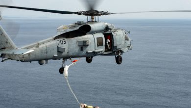An MH-60R Seahawk drops a practice Mk 54 torpedo during a torpedo exercise