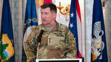 Gen. David Hodne speaks at a podium during the activation ceremony for the US Army Futures and Concepts Command under T2COM.