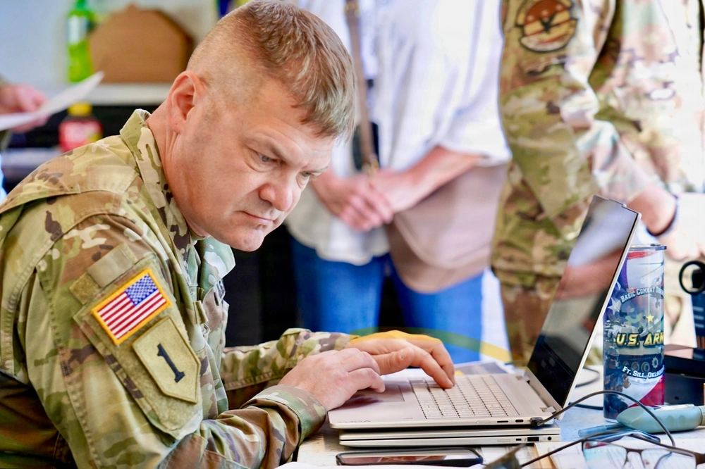 A US Army soldier works on a laptop during a training event at Fort Sill, Oklahoma, as the Pentagon expands artificial intelligence use across military operations. Photo: Susan McGovern/US Army