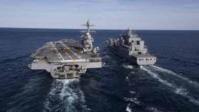 The world's largest aircraft carrier, USS Gerald R. Ford (CVN 78), conducts a replenishment at sea (RAS) with the John Lewis-class underway replenishment oiler, USNS Harvey Milk (T-AO 206),