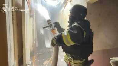 Ukrainian emergency crews respond at the scene of a Russian drone attack in the southeastern city of Zaporizhzhia on Saturday that killed one person and injured another, authorities said.